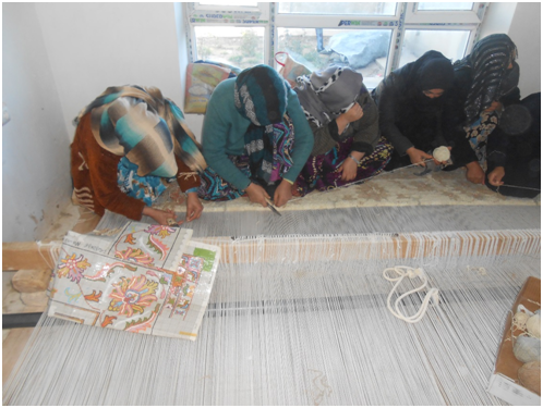 Carpet Weaving Project beneficiaries during work 3