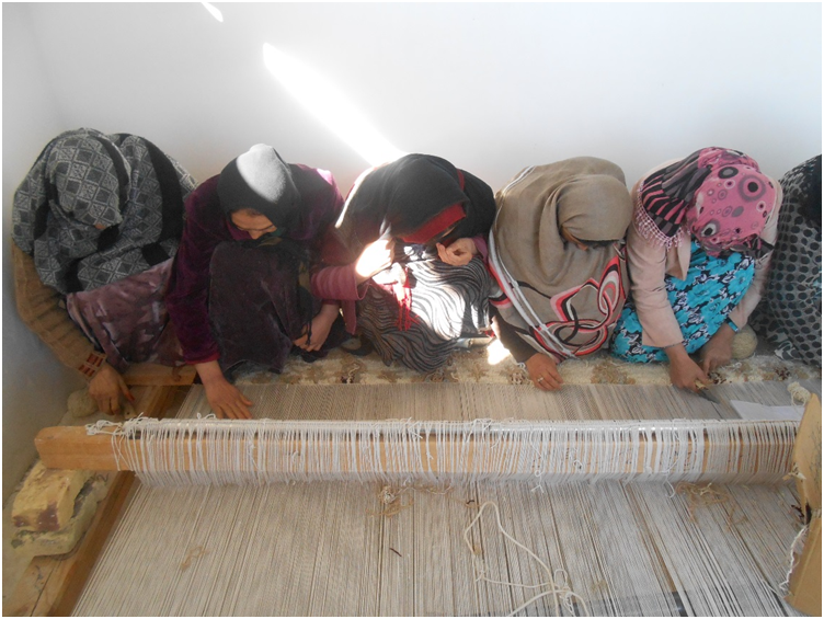 Carpet Weaving Project beneficiaries during work 4