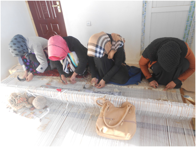 Carpet Weaving Project beneficiaries during work 5