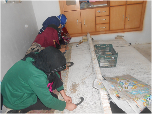 Carpet Weaving Project beneficiaries during work 6