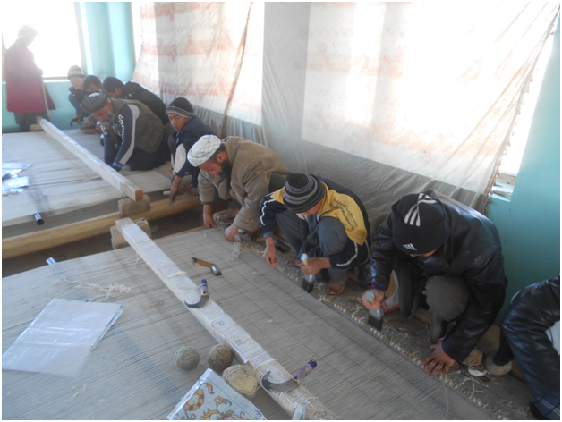 Carpet Weaving Project beneficiaries during work 7