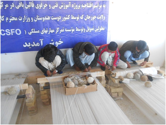 Carpet Weaving Project beneficiaries during work male